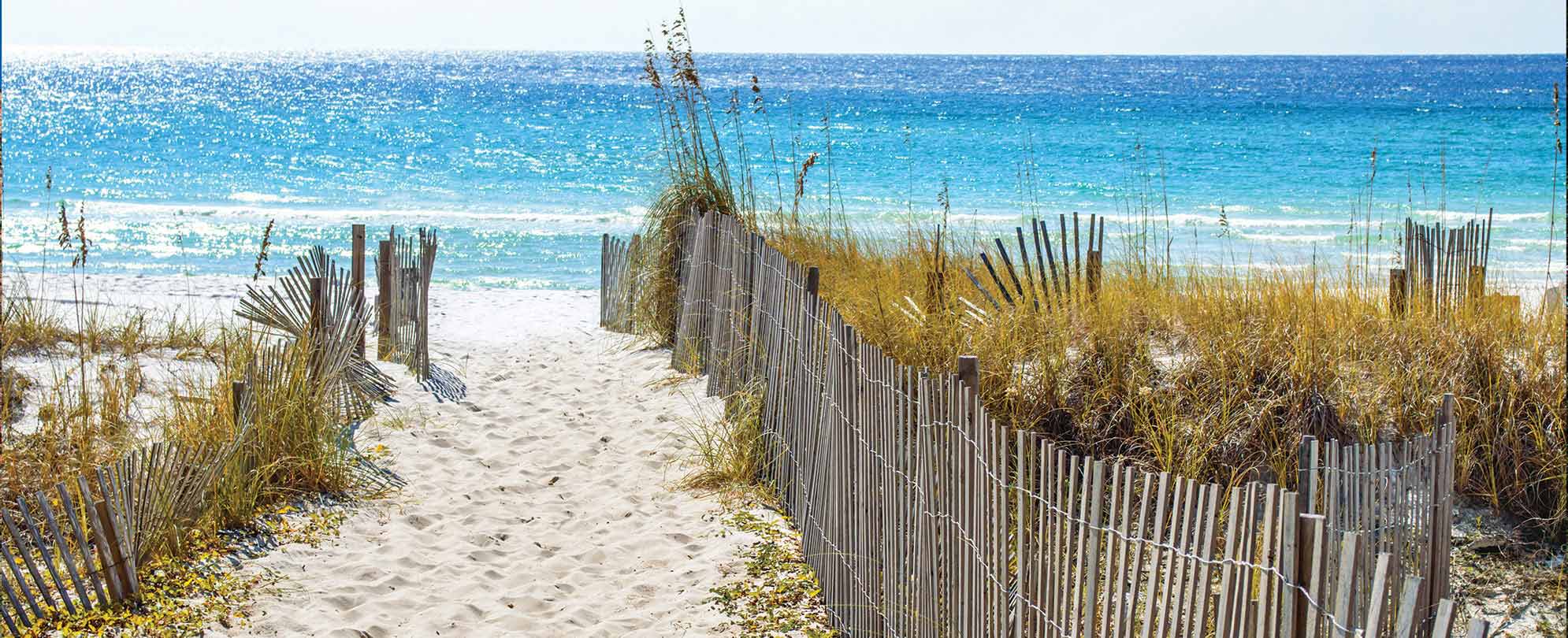 A white-sand beach part of Gulf Islands National Seashore, stretching over the coastal barrier islands of Florida and Mississippi