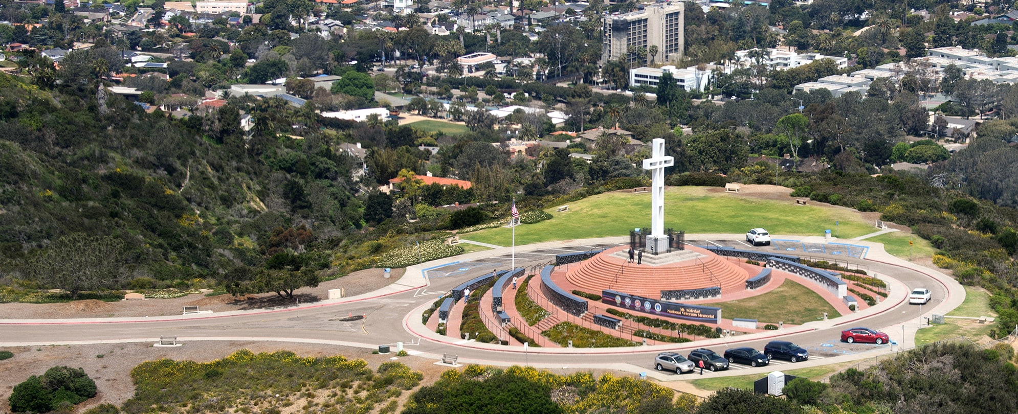 A white cross standing atop Mount Soledad National Veterans Memorial in San Diego, California.