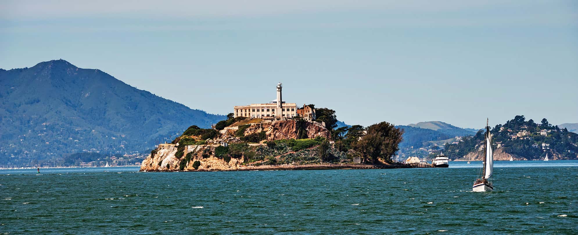 Alcatraz Island surrounded by water off the coast of San Francisco, California.