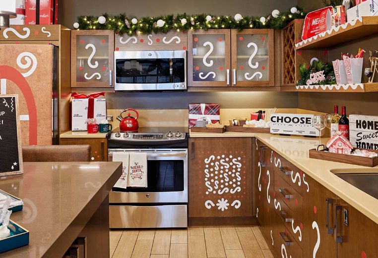 A fully decorate kitchen inside a Hallmark Channel Countdown to Christmas Holiday suite at Club Wyndham Resort at Avon. 