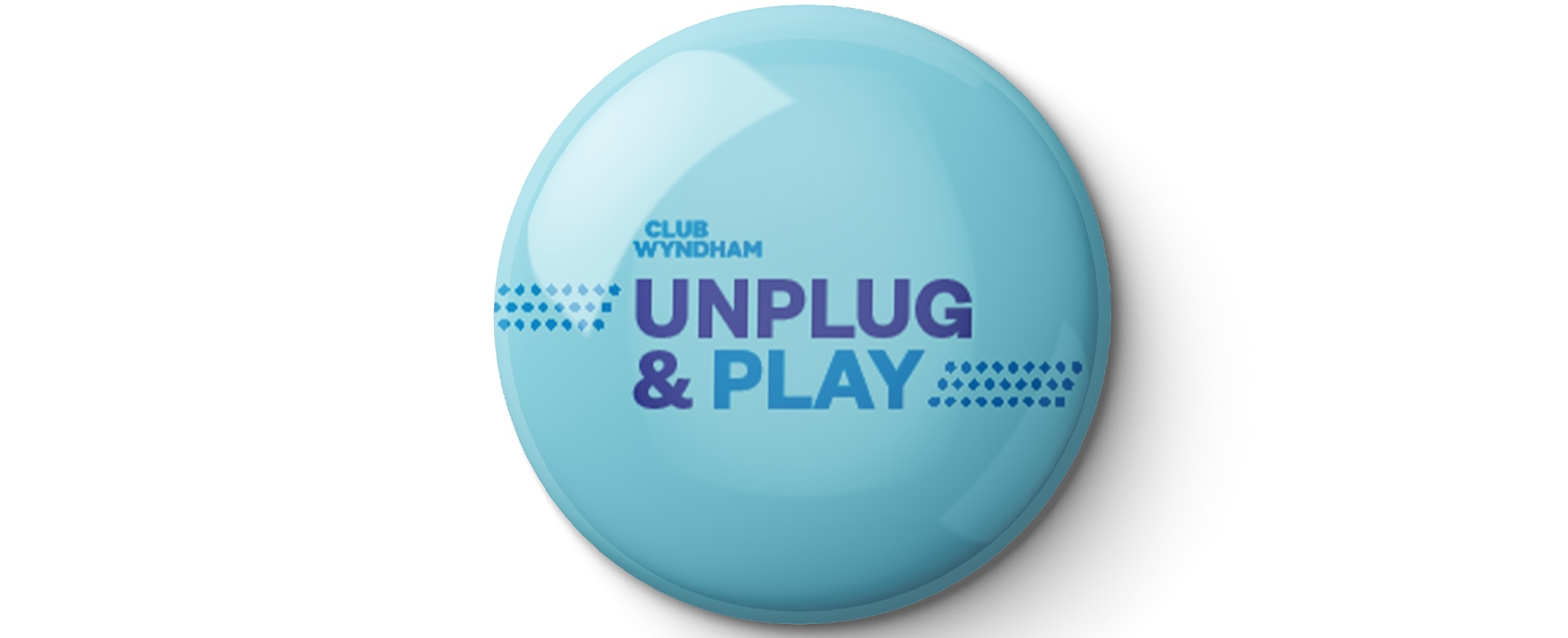 A Club Wyndham Pinspiration "Unplug & Play" pin.
