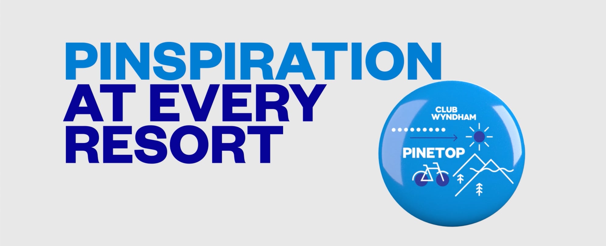 A blue Club Wyndham "Pinetop" pin on a banner that says, "Pinspiration at every resort."