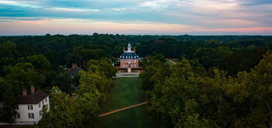 Spooky aerial view of the Governor's Palace in Williamsburg, Virginia, at dusk.	