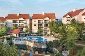 The exterior and pool at Club Wyndham Branson at the Meadows, a timeshare resort in Branson, Missouri.