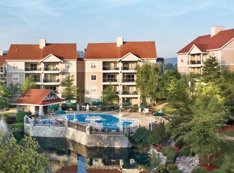 The exterior and pool at Club Wyndham Branson at the Meadows, a timeshare resort in Branson, Missouri.