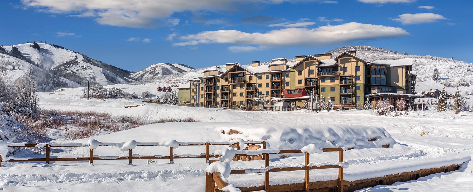 The outside of the Club Wyndham Park City resort covered in snow.  