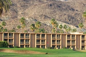 Mountains and a golf course surrounding WorldMark Plaza Resort & Spa, a timeshare resort in Palm Springs, California.