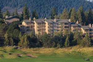 Tall trees surrounding a large resort with a golf course in Oregon at the Worldmark Running Y.