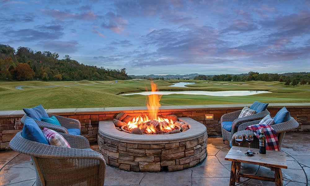 Firepit with seating facing the golf fields at the Club Wyndham Great Smokies Lodge