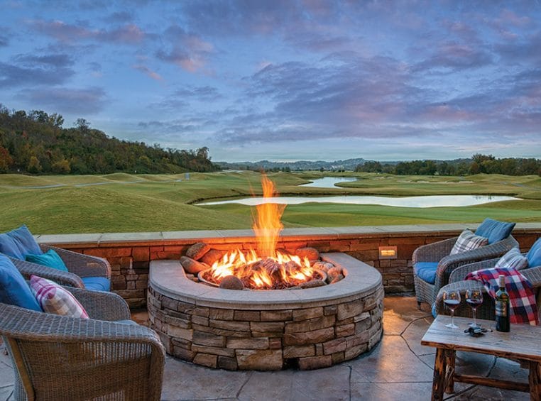 Firepit with seating facing the golf fields at the Club Wyndham Great Smokies Lodge