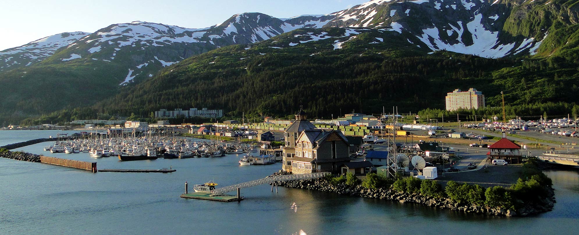 View of a waterfront town in coastal Alaska as seen from a cruise ship